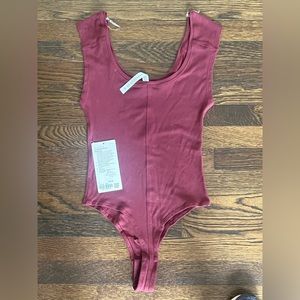Lululemon scoop neck body suit.